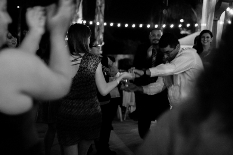 photography by paulina outdoor fall wedding reception string lights black and white photo