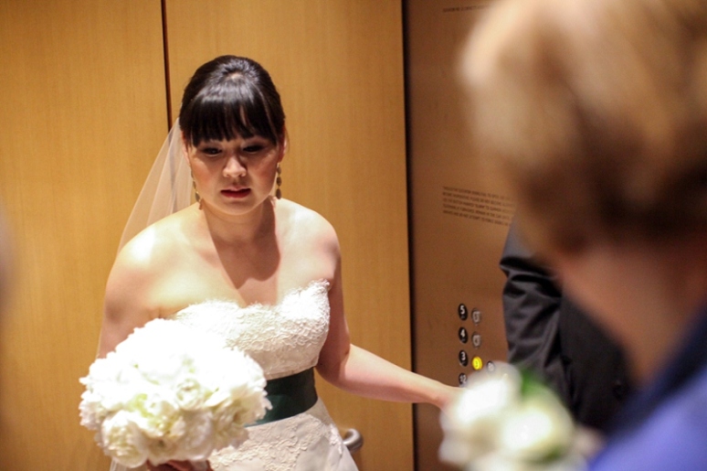 bride in elevator at walt disney concert hall wedding photo