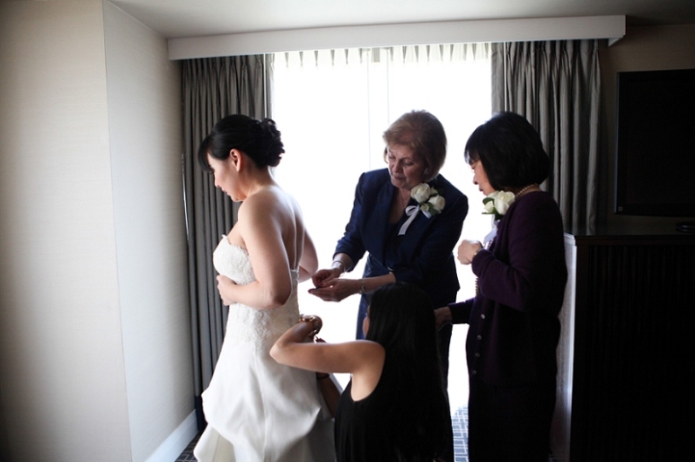 bride getting ready at omni hotel wedding photo